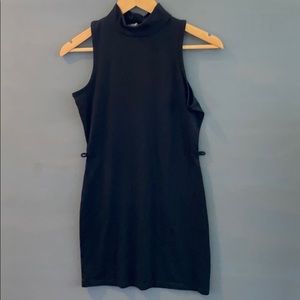 La classic couture black knee high dress size M